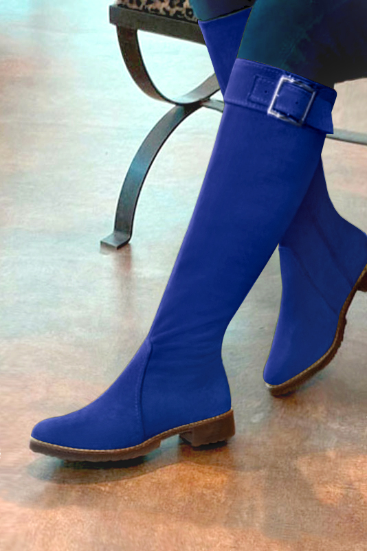 French elegance and refinement for these electric blue riding knee-high boots, 
                available in many subtle leather and colour combinations. Record your foot and leg measurements.
We will adjust this pretty boot with zip to your measurements in height and width.
Its large, comfortable gum sole will isolate you from the ground.
You can customise the boot with your own materials, colours and heels on the "My Favourites" page.
To style your boots, accessories are available from the boots page. 
                Made to measure. Especially suited to thin or thick calves.
                Matching clutches for parties, ceremonies and weddings.   
                You can customize these knee-high boots to perfectly match your tastes or needs, and have a unique model.  
                Choice of leathers, colours, knots and heels. 
                Wide range of materials and shades carefully chosen.  
                Rich collection of flat, low, mid and high heels.  
                Small and large shoe sizes - Florence KOOIJMAN